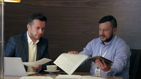 Two men entrepreneur talking during coffee break on office meeting in office Stock Footage 97226831