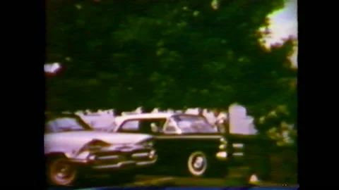 Two men examining a new car that was just purchased Video stock 147948489