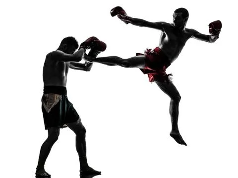 Two men exercising thai boxing silhouette Stock Photos