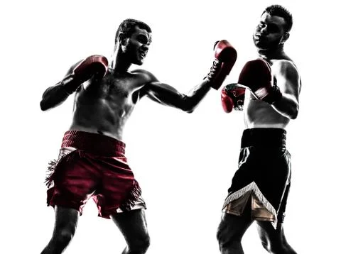 Two men exercising thai boxing silhouette Stock Photos