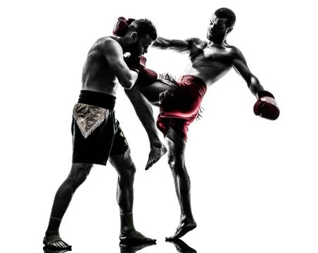 Two men exercising thai boxing silhouette Stock Photos