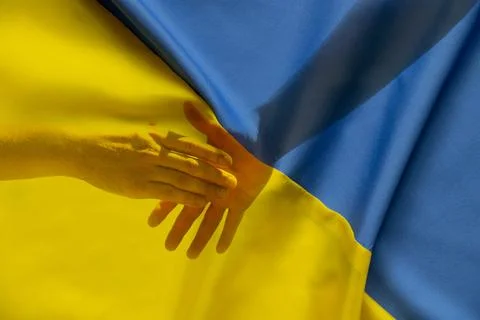 Two men extended their hands to each other as a sign of friendship and greeti Stock Photos