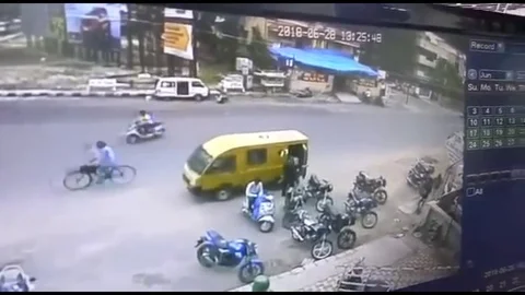Two men flee after stealing $9,000 from bank worker in daylight robbery Stock Footage 106318254