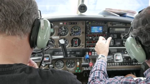 Two men fly a single engine aircraft in air space The Netherlands Stockbeeldmateriaal 135505062