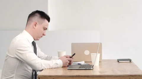 Two men greet each other shake hand on workplace. colleagues enter come in 스톡 동영상 133219650
