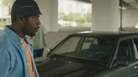Two Men Having Fight near Car under Bridge Stock Footage 247167494