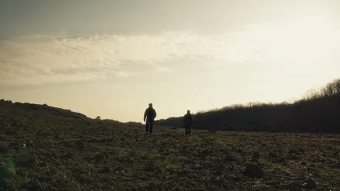Two men on a hiking trip over a mountain on the Black Sea - Video 動画素材 271073556