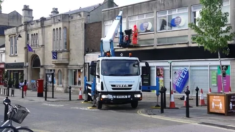 Two men in a hoist on a lorry. Stock Footage 138209482