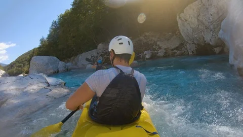 Two Men Kayaking Through Rapids Stock Footage 118362400