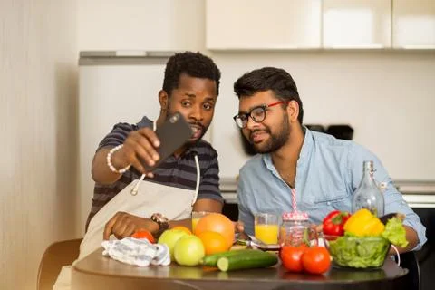 Two men in the kitchen Stock Photos