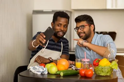 Two men in the kitchen Stock Photos