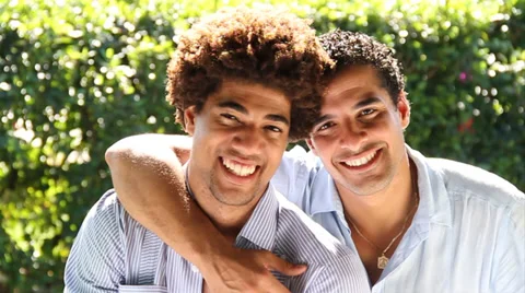 Two men laughing &amp; hugging Stock Footage 38762146