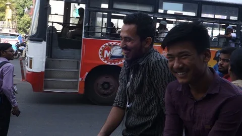 Two-men-laughing-on-the-street Stock Footage 98434488