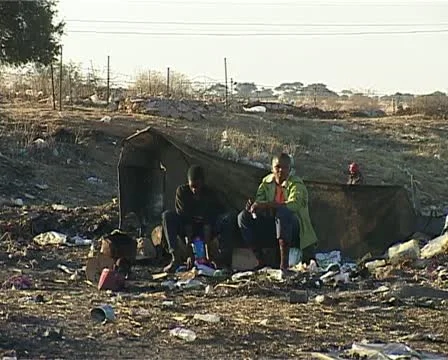 Two men that live at the dump site. Stock Footage 11496317
