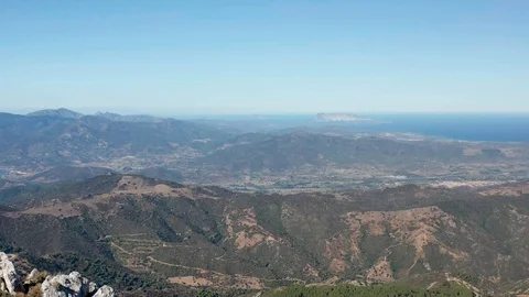Two men look at the breathtaking view from the top of the mountain Stock-Footage 118224056