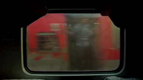 Two Men Looking Out Train Window in India, Friends Traveling on Indian 스톡 동영상 329775609