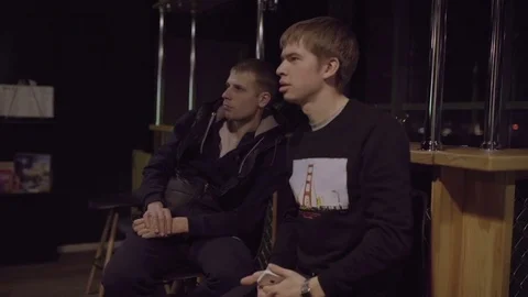 Two men looking at something Stock Footage 76595793