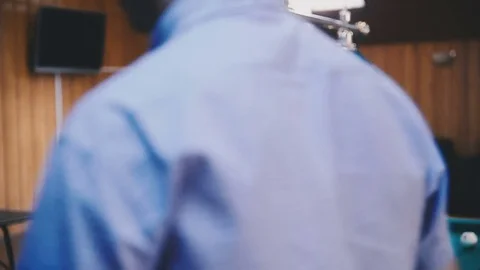 Two men play billiards Stock Footage 81543776