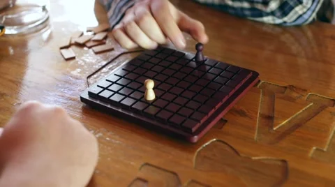 Two men playing a board game, close-up. 스톡 동영상 66557534