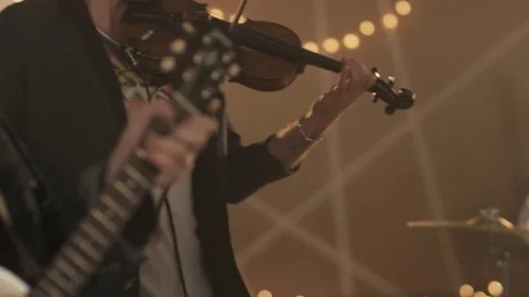 Two Men Playing Violin and a Guitar Stock Footage 74495290