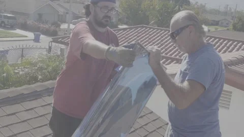 Two Men Pulling Off the Protective Film and Replacing a Skylight Window (RAW) Stock Footage 212418075