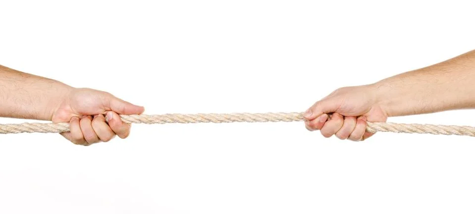 Two men pulling a rope in opposite directions isolated Foto stock