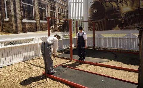 Two Men On Putting Course Stock Photos