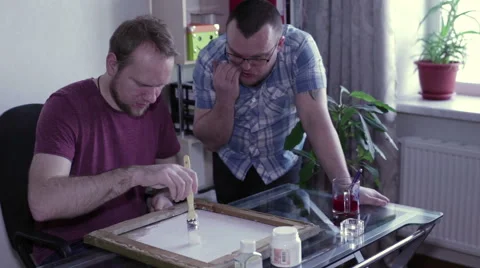 Two men restored canvas Stock Footage 59788935