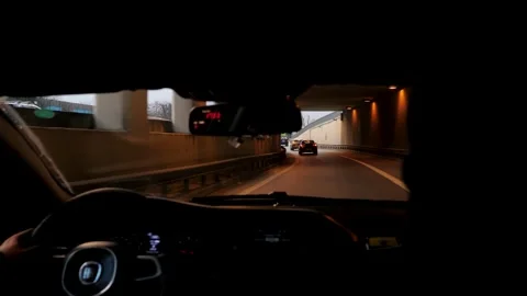 Two men ride in a taxi through a tunnel in Istanbul Stock Footage 202009062