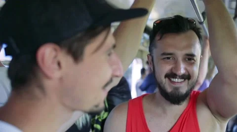 Two men riding in the subway Stock Footage 65259498