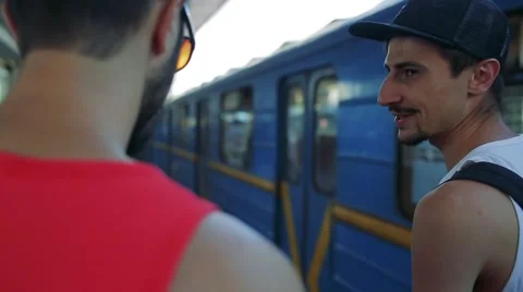 Two men riding in the subway Stock Footage 65259665