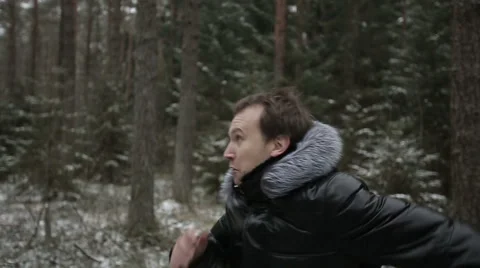 Two men running through the woods. Slow motion Stock Footage 44724644