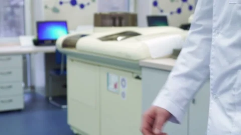 Two men shake hands at the laboratory Stock Footage 71341120