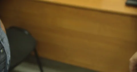 Two men shake hands in the office Stock Footage 113282484