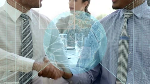Two men shaking hands in business meeting after holo globe data panels Stock Footage 335235839