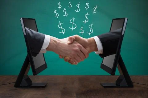 Two Men Shaking Hands From Computer Screen Stock Photos