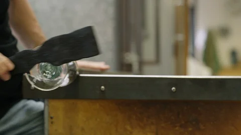 Two men shaping glass on pipe Video stock 107891976