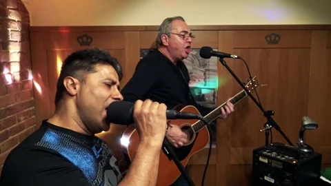 Two Men Sing And Play Karaoke In A Bar Stock Video Pond5