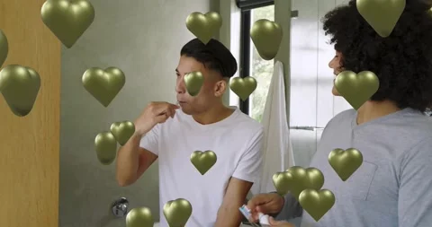 Two men at sink, dispensing toothpaste and brushing teeth for health, metallic Stock Footage 323354293
