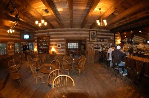Two men sitting in the Owl Bar having a beer, Sundance resort, wide angle len Stock Photos