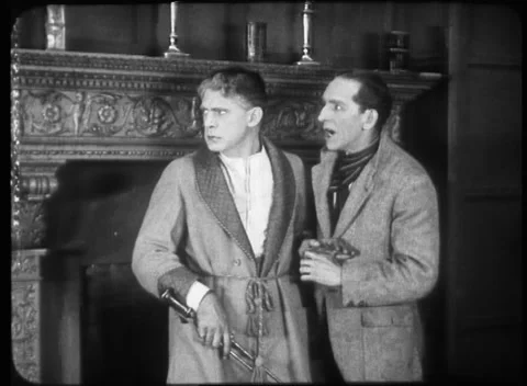 Two men spending night in office room out of fright, United Kingdom, 1923 Video stock 172219333