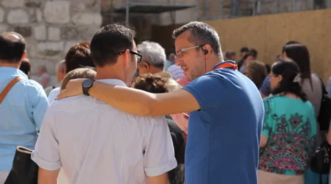 Two men stand talking Stock Footage 32152377