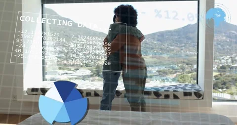 Two men stepping closer as overlay animating numbers into charts, embracing Stock Footage 327121702