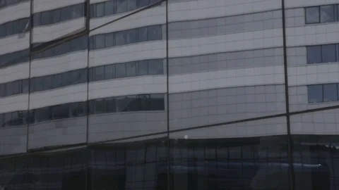 Two men in suits shake hands Stock Footage 71749463