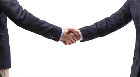 Two men in suits shake hands Stock Photos