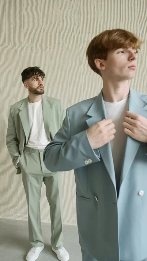 Two men in suits standing together Video stock 277568770
