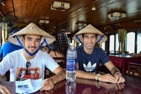 Two Men Taking A Halong Bay Cruise Stock Photos