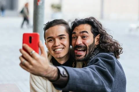 Two men taking a selfie with a cell phone Stock Photos