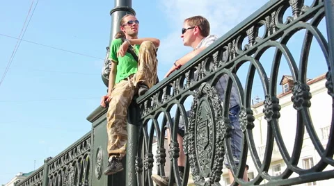 Two men talking on the bridge Video stock 42647233