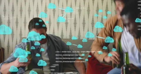 Two men talking on couch causing cloud code overlay, toasting green bottles, Stock Footage 317733790